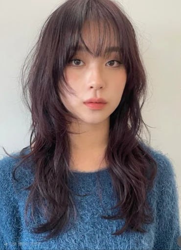 Wavy style with bangs