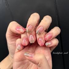 Pink and gold glitter nail art